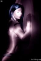 Blue hair. Flat wall. Light painted infrared photograph.