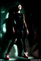 Woman in green. Red shoes. Light painting photograph.