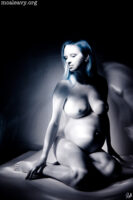 Pregnant figure nude. Light painted infrared photograph.