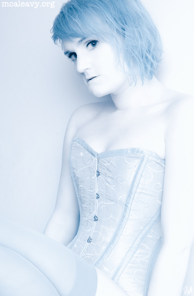 Corset, stockings and blue hair. Infrared photograph.