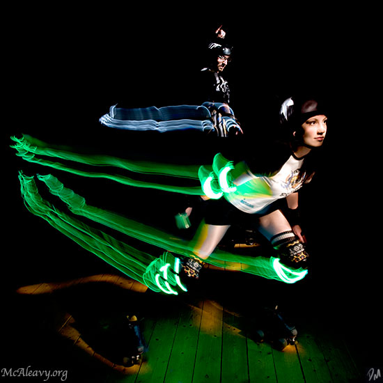 Roller derby skater with light streaks. Light painted photograph.