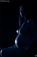 Pregnant figure nude. Light painted photograph.