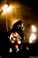 Female figure nude with mask. Plague doctor. Light painting photograph.