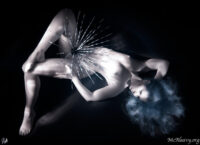 Nude with spines. Infrared light painted photograph.