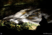 Self portrait at the Falls of Clyde. Light painted landscape photograph.